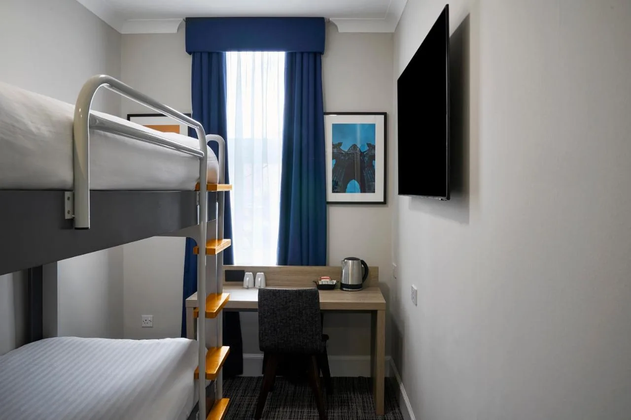 Room with work desk and bunk beds at Four Points Flex by Sheraton Edinburgh